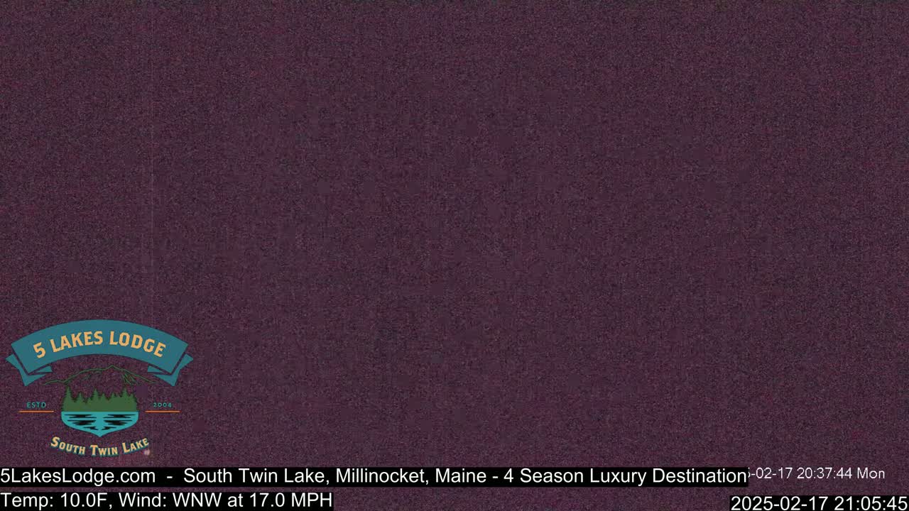 A dark purple screen displays a logo for a lodge.