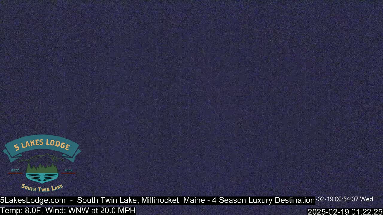 A dark blue screen shows a mostly obscured view of nighttime outdoors.