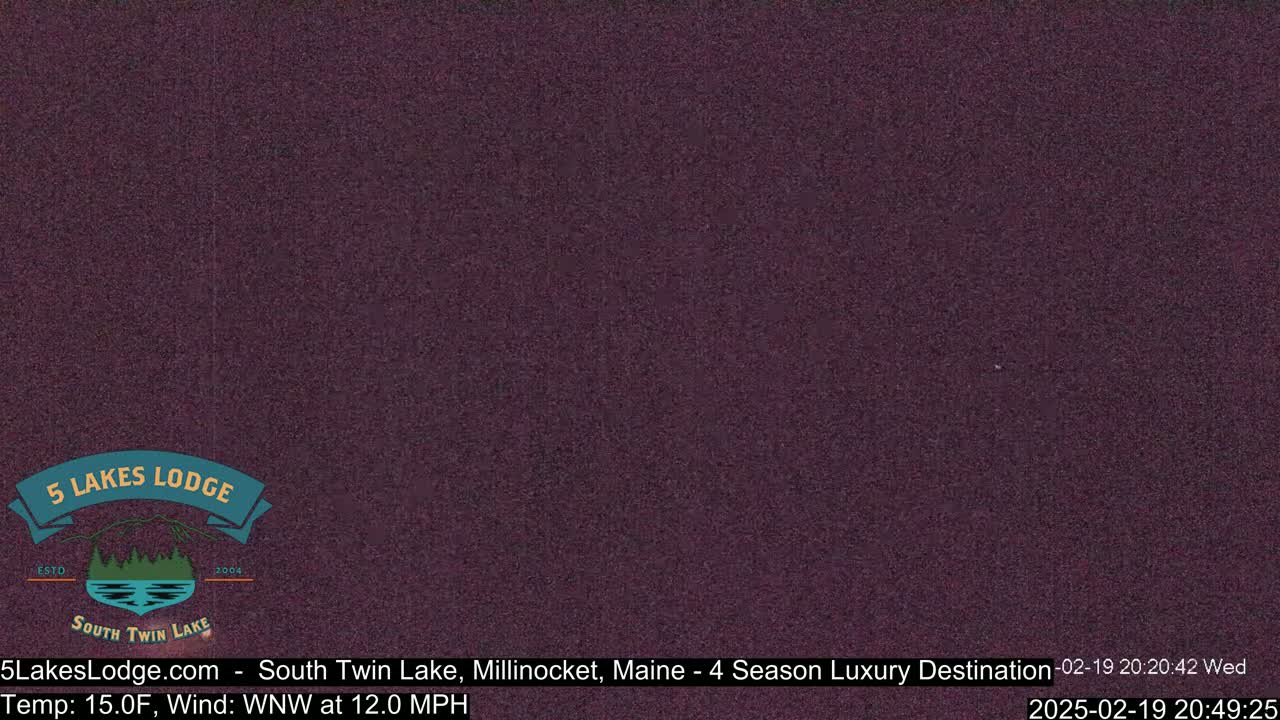 A dark purple screen displays a still image of nighttime conditions.