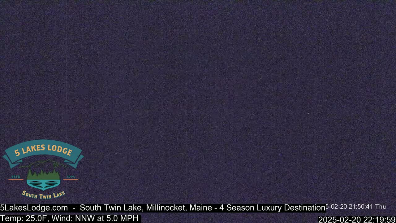 A dark purple screen displays a nighttime view with a slight north-northwest wind at 5 miles per hour and a temperature of 25 degrees Fahrenheit.