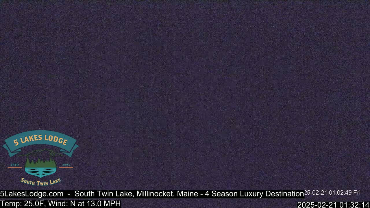 A dark purple screen displays a logo for a lodge.