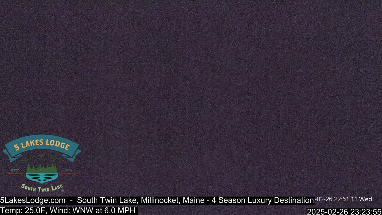 A dark purple screen displays a logo for a lodge.