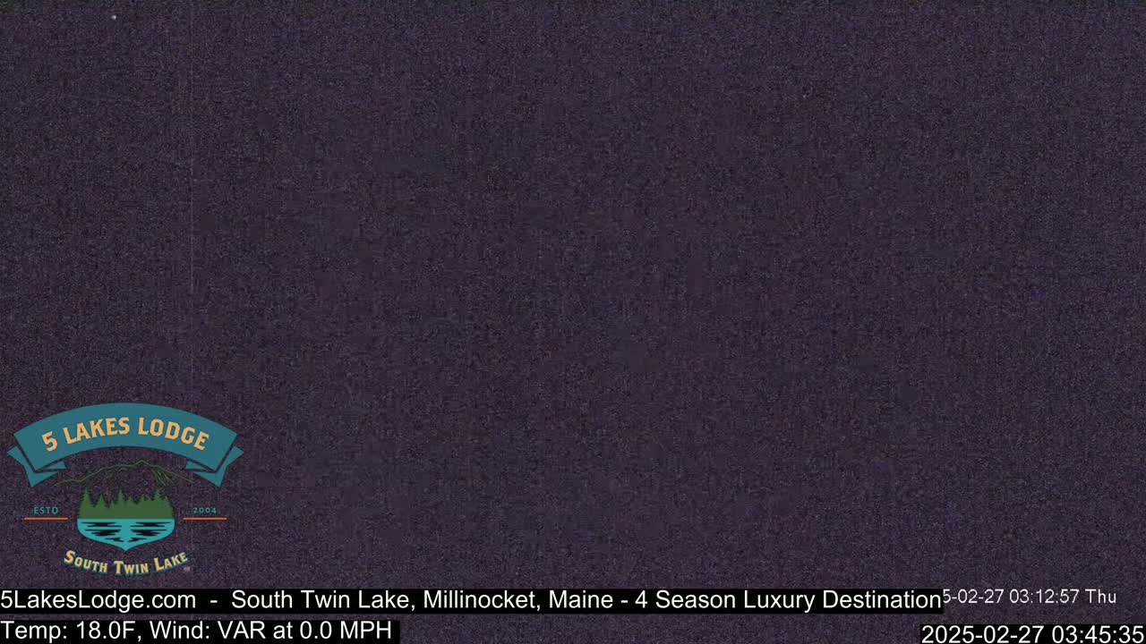 A dark purple screen displays a logo for a lodge.