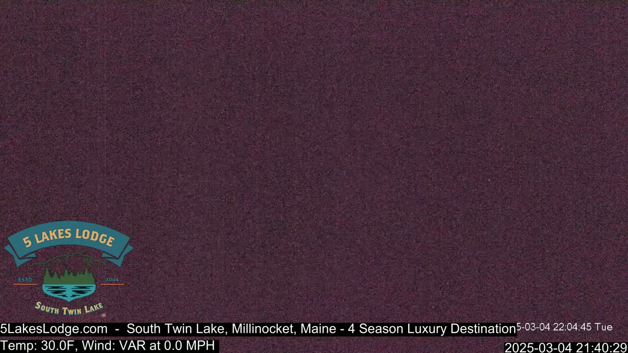 A dark purple screen shows a logo for a lodge near a lake.