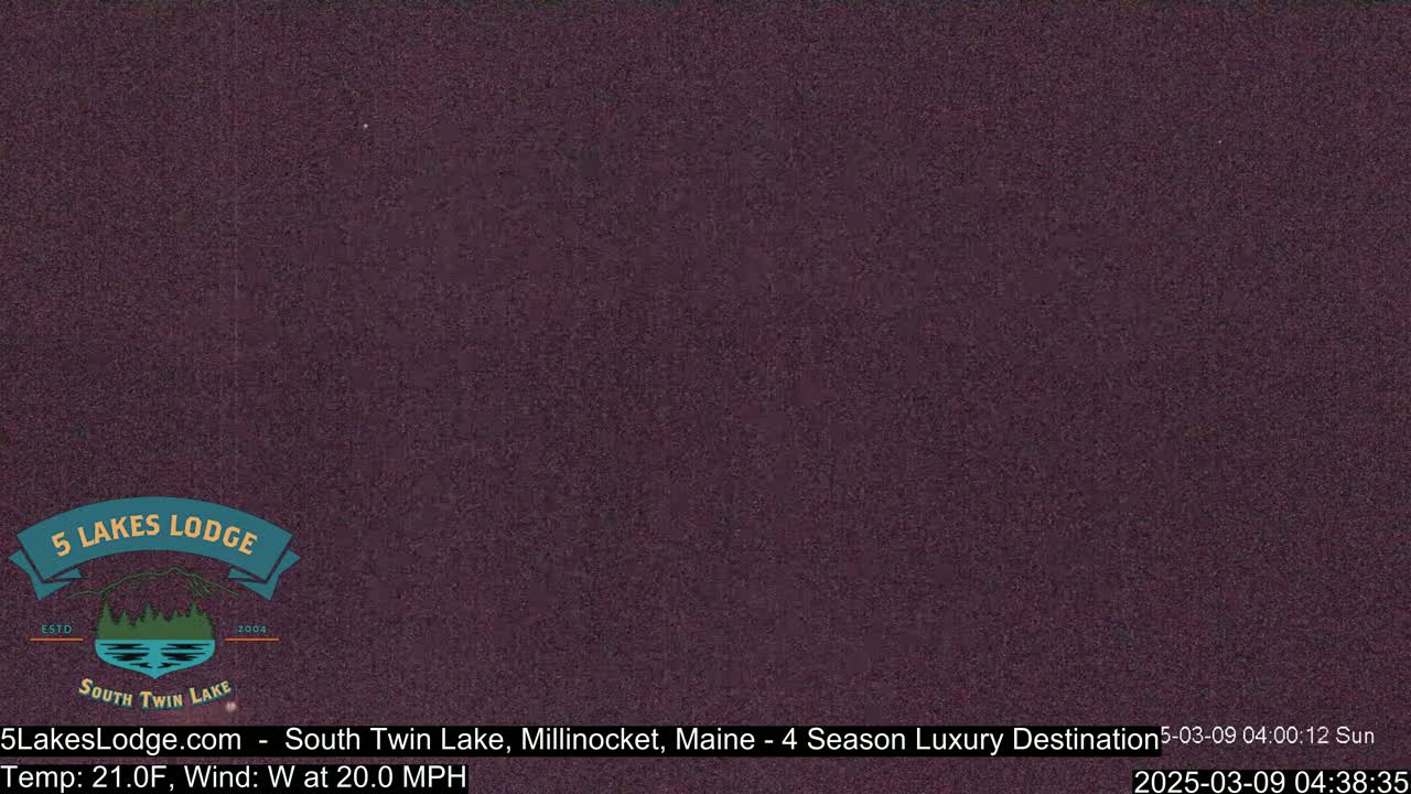 A dark purple nighttime scene shows a mostly featureless sky.
