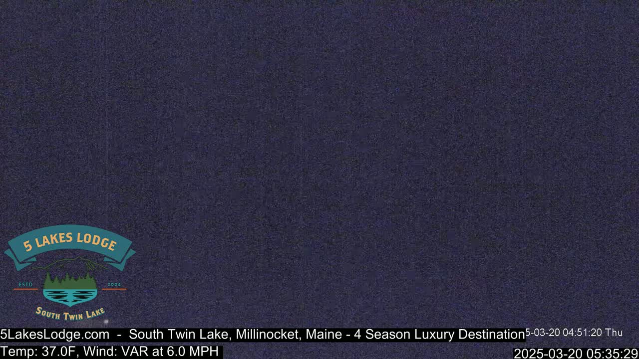A dark blue, grainy image is shown.