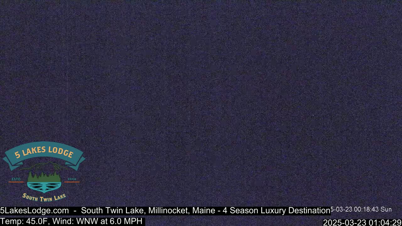 A dark, grainy image shows a mostly solid, dark-blue screen.