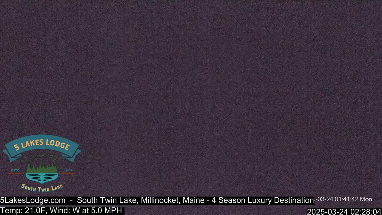 A dark purple screen displays a webcam image showing only a solid color with no discernible features.