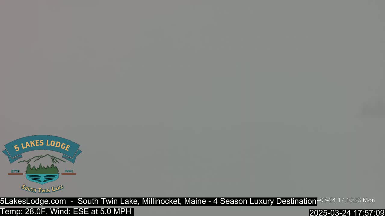 A gray, overcast sky is visible, with a light wind blowing from the east-southeast at 5.0 mph and a temperature of 28 degrees Fahrenheit.