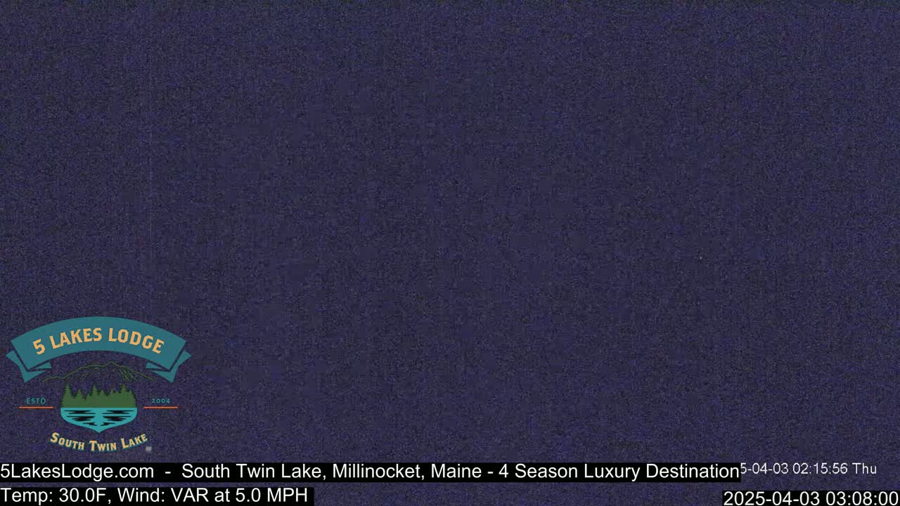 A solid dark blue screen displays weather information indicating a temperature of 30 degrees Fahrenheit and a variable wind speed of 5 mph.