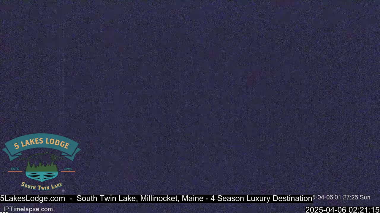 A dark blue screen displays a logo for a lodge.