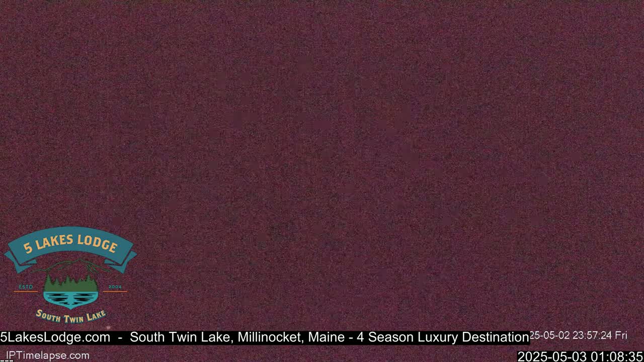 A solid, dark-maroon colored screen is displayed.