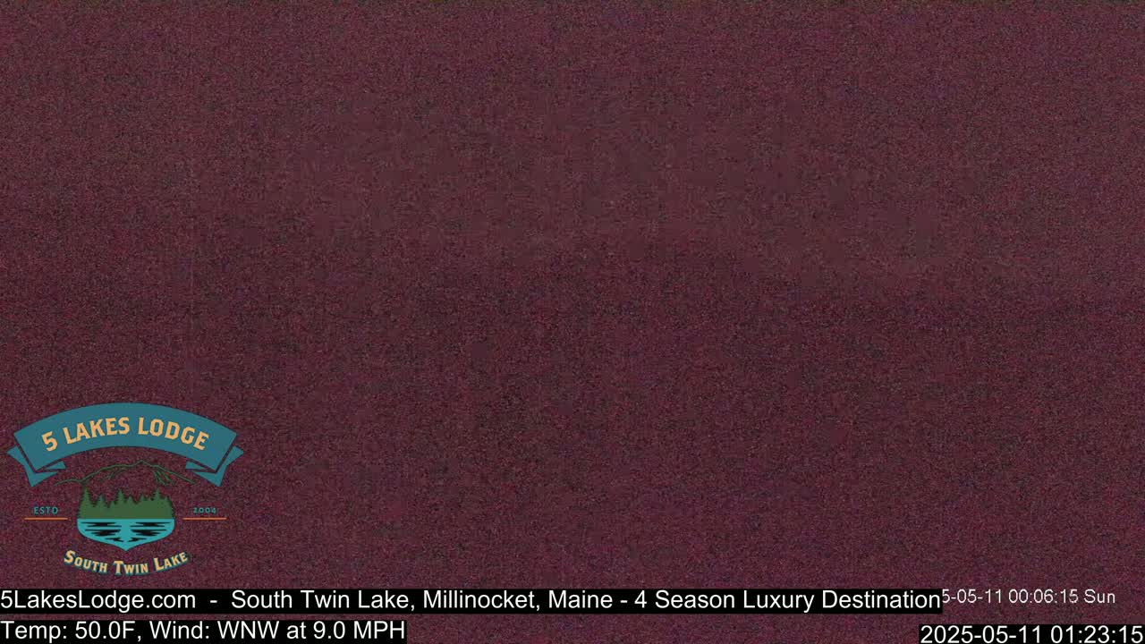A dark reddish-purple image shows a mostly clear sunny sky with a 50°F temperature and a 9 mph wind.