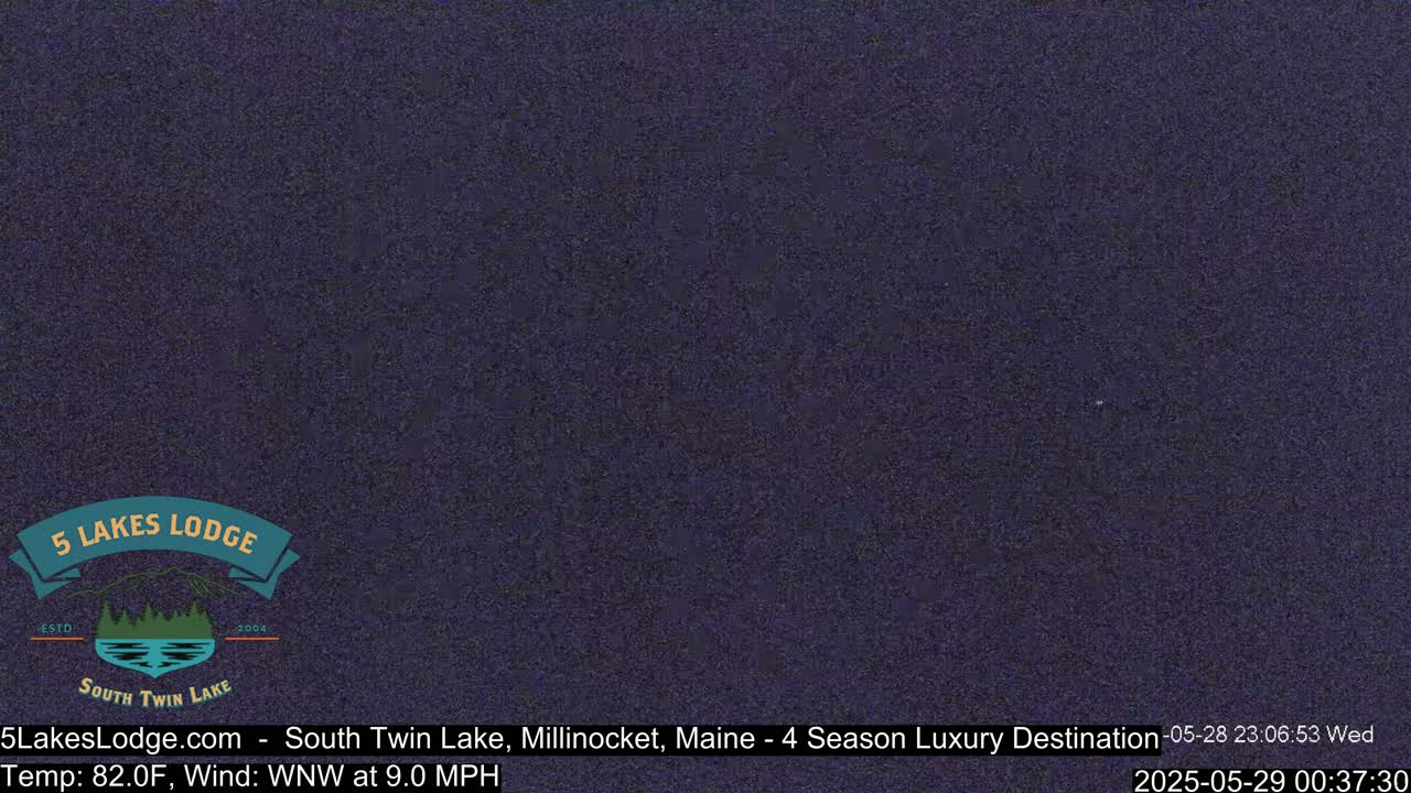 A dark purple screen displays a nighttime view with a wind of 9.0 mph from the west-northwest and a temperature of 82.0°F.