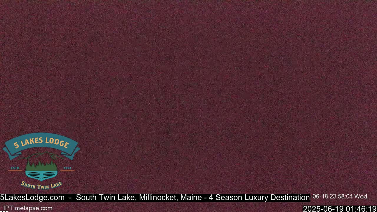A solid, dark reddish-brown screen displays a static image.