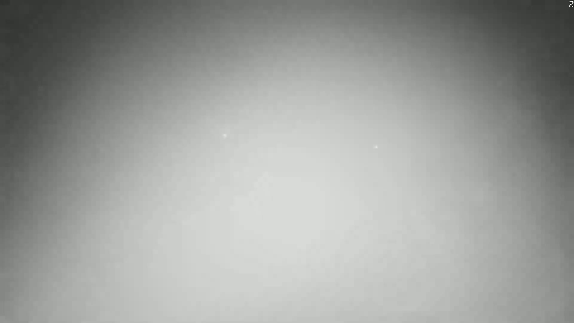 A hazy, overcast sky is visible.