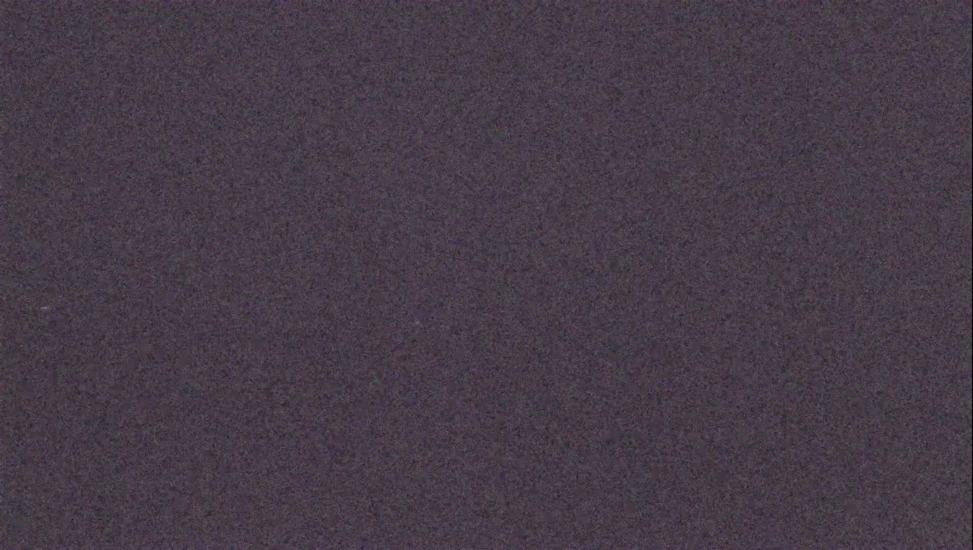 A dark gray textured surface is shown.