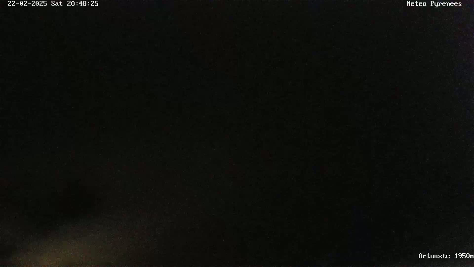 A completely dark image, likely taken at night.