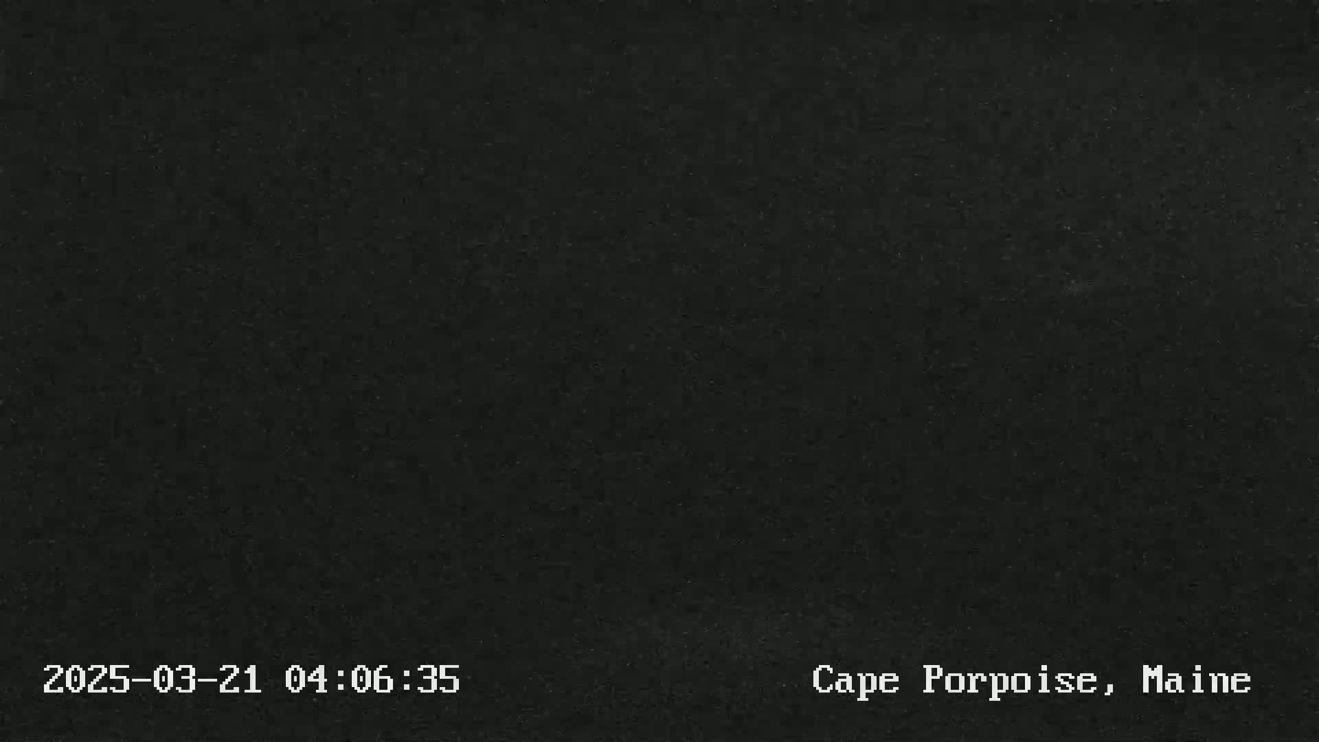 The image shows a completely dark, solid black screen.