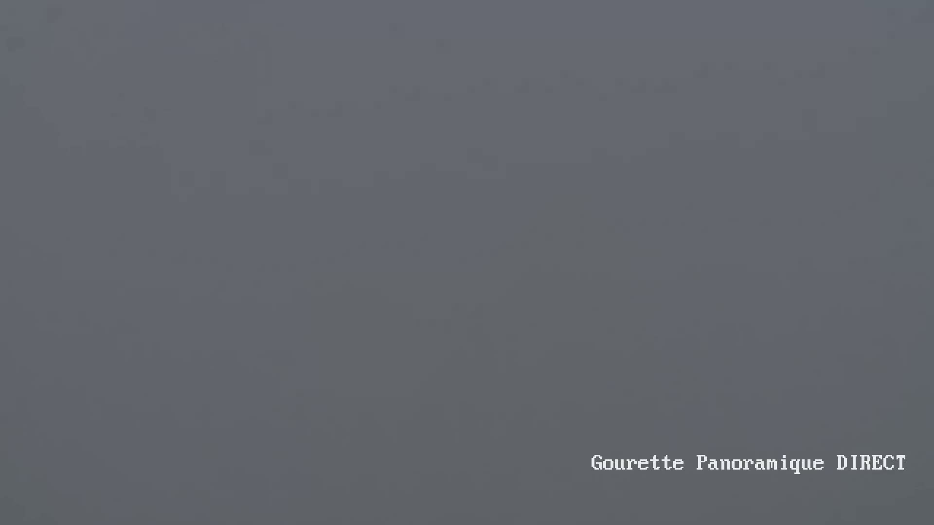 A solid, uniformly gray image depicts a foggy or overcast sky.