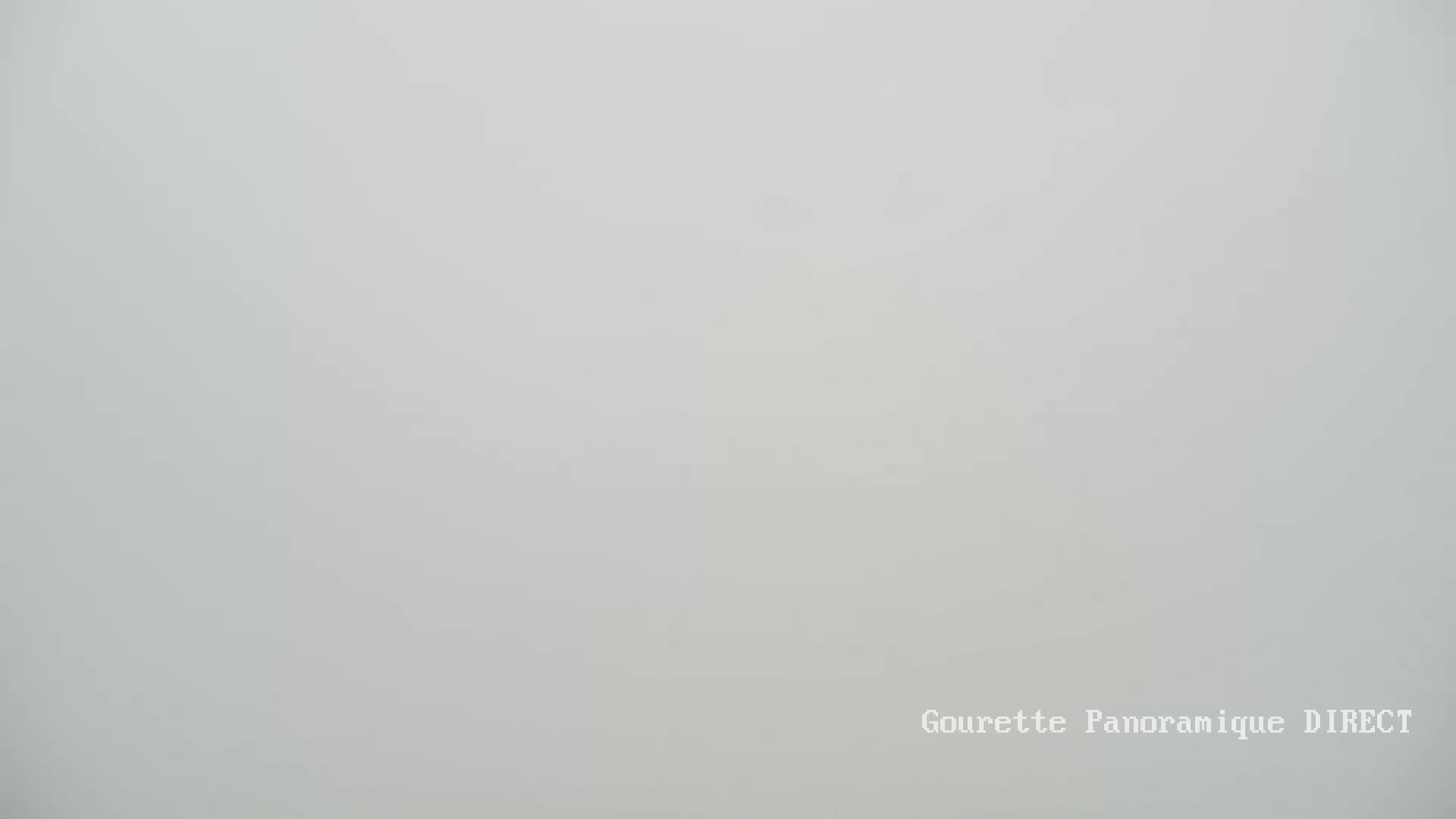 The image shows a solid, light gray background.