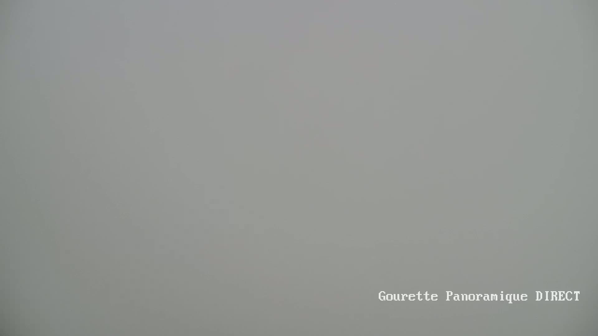 A very foggy or hazy outdoor scene is visible.