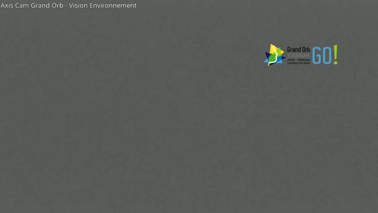 A dark gray textured background is shown.