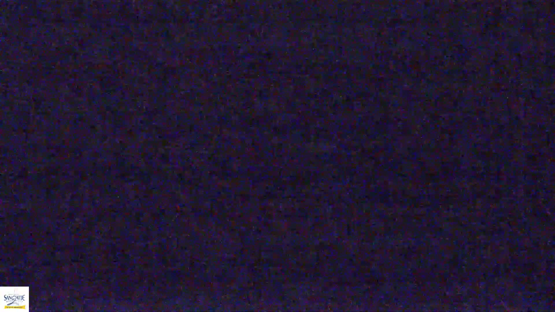 The image shows a dark blue, grainy texture.