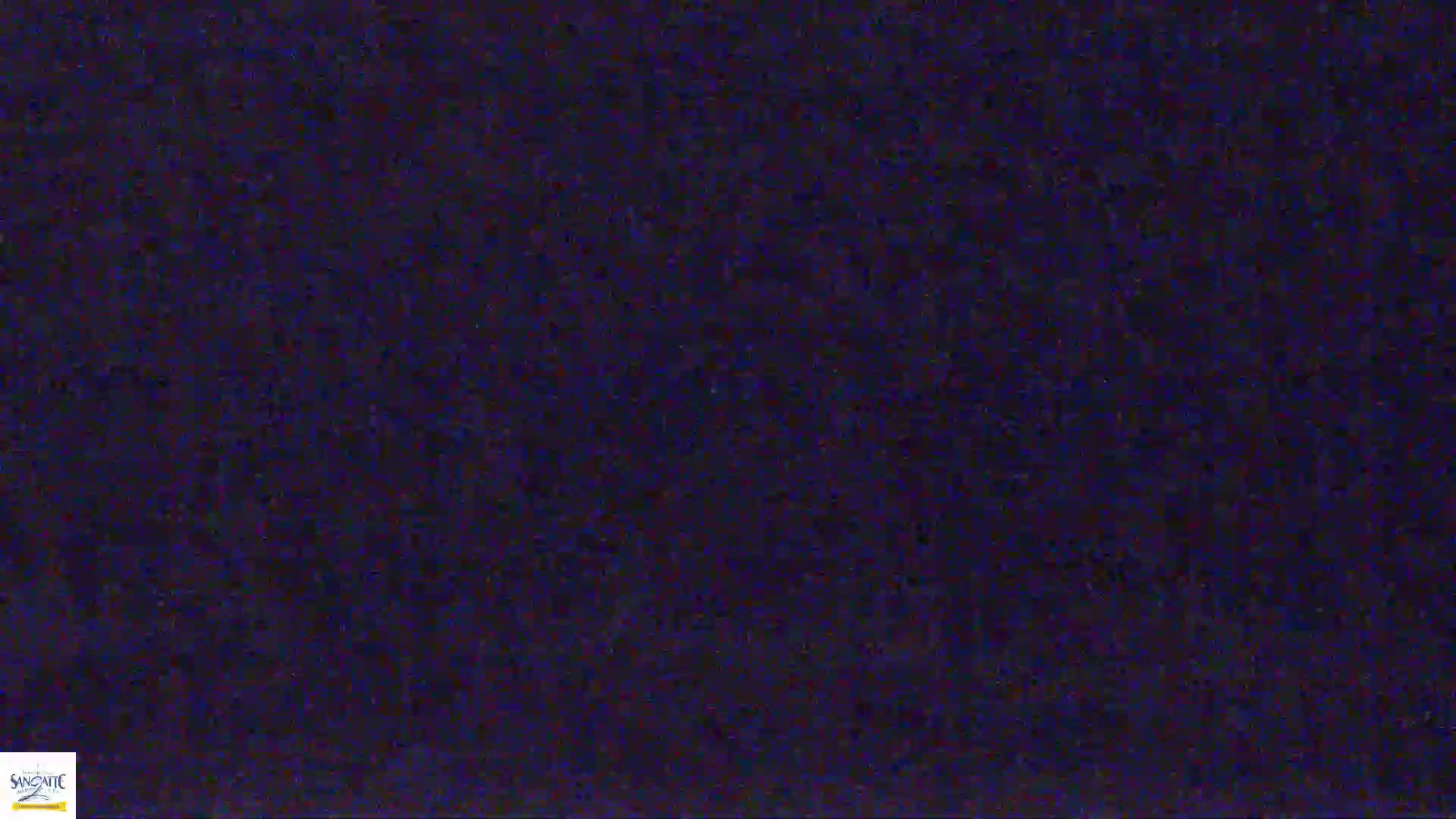 A dark blue, grainy texture fills the entire image.