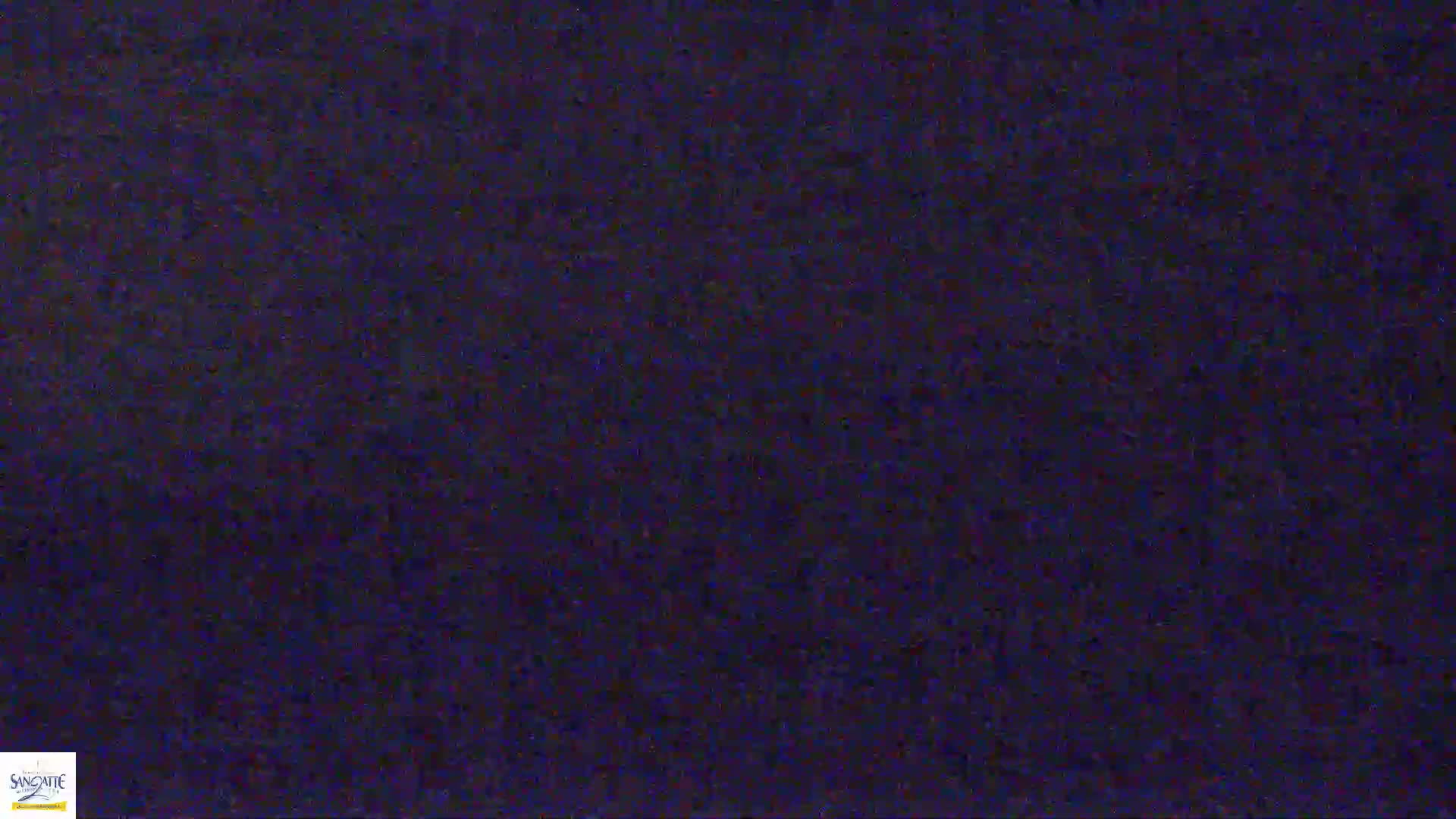 A dark blue, grainy texture fills the entire image.