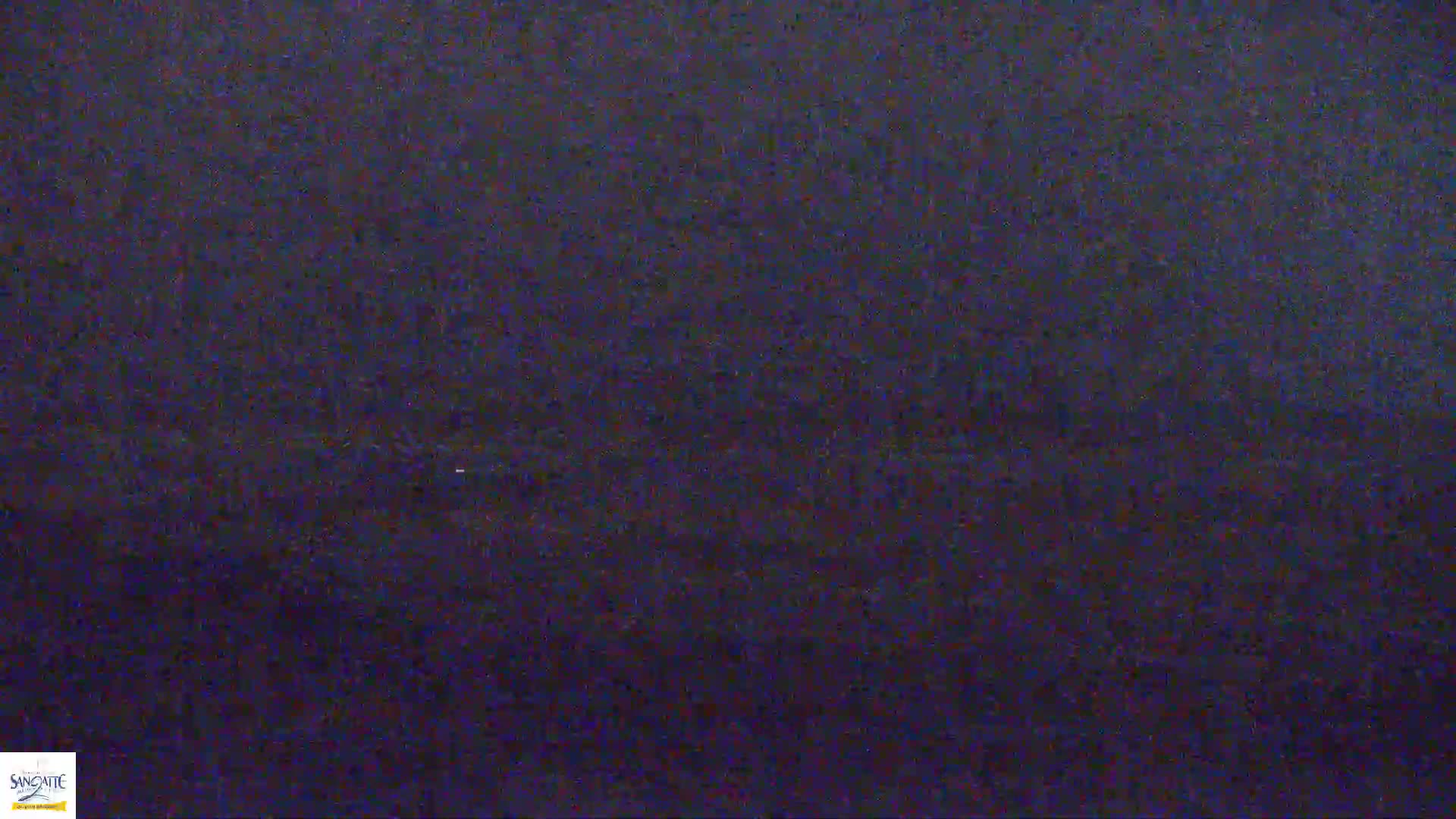 A dark purplish-blue textured surface is shown.