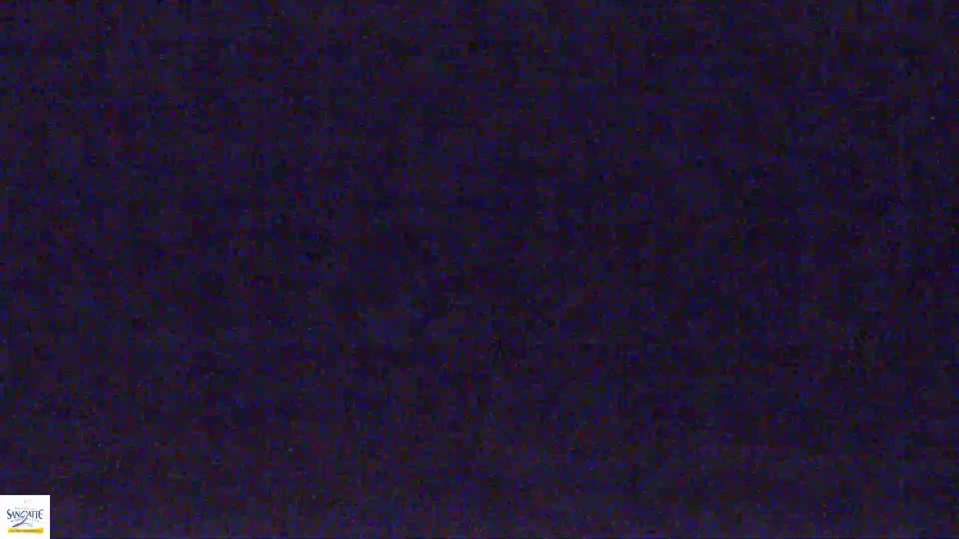 The image shows a dark blue, textured surface.