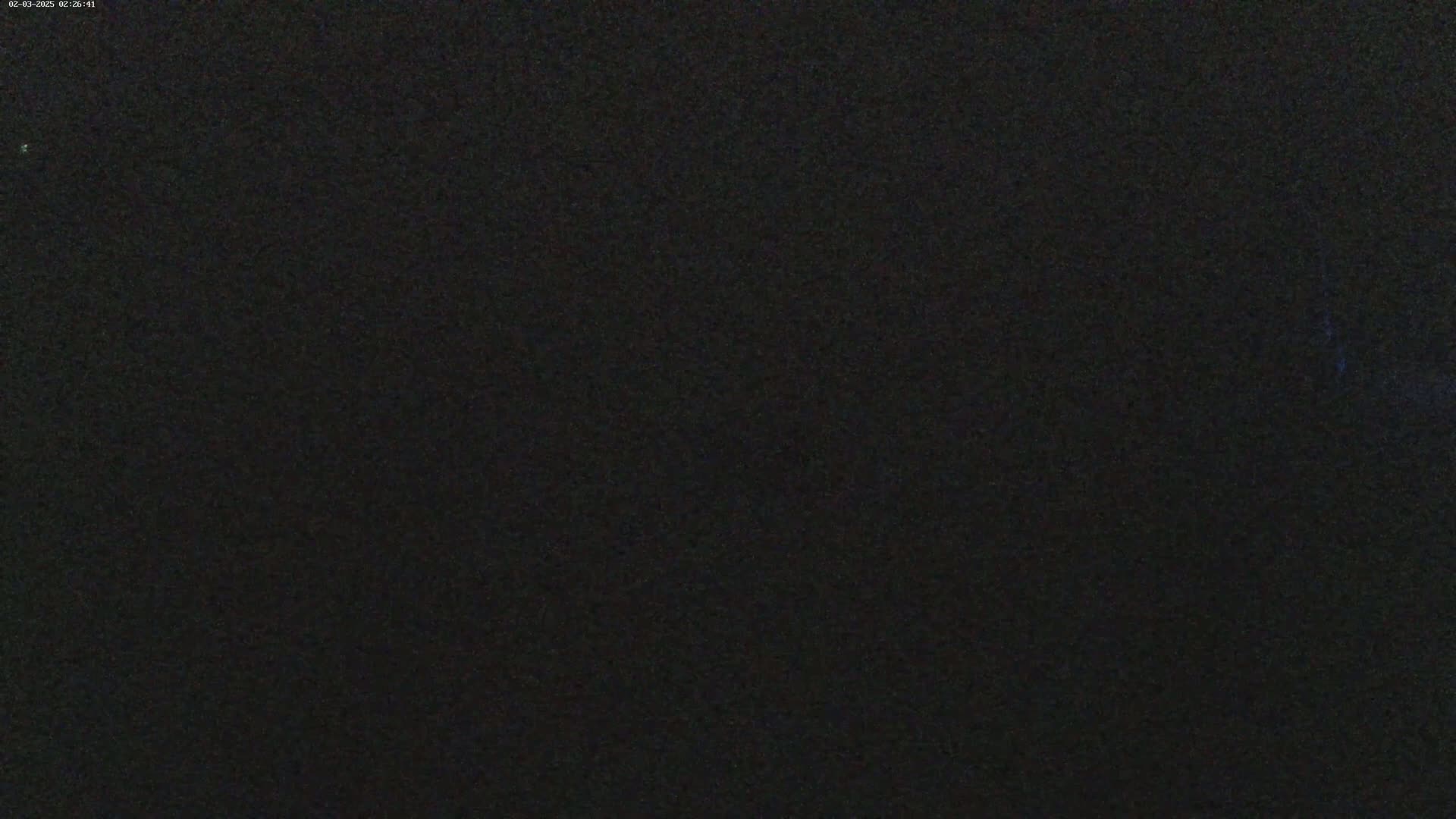 A uniformly dark, grainy image is visible.