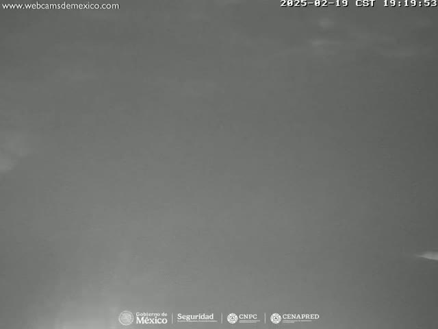 A low-light, overcast sky is visible.
