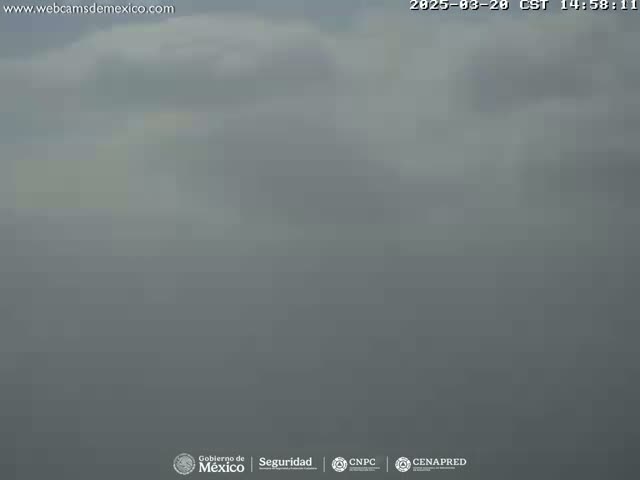 A hazy, overcast sky is visible.