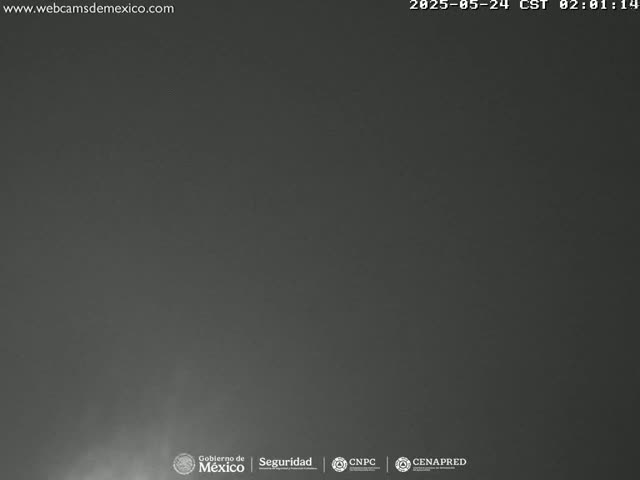 A dark gray, overcast sky is visible.