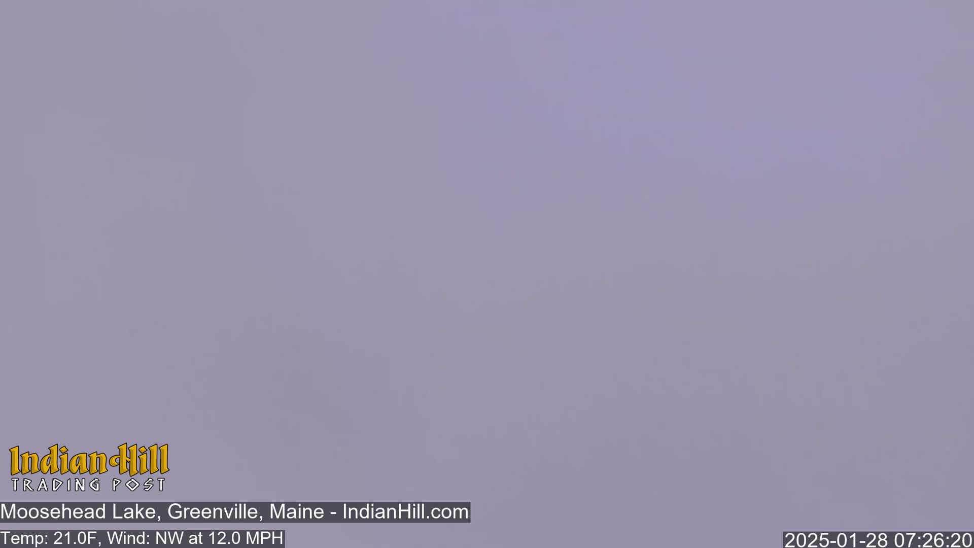 A solid, light-purple haze obscures the view outdoors, with a northwest wind at 12 mph and a temperature of 21 degrees Fahrenheit.