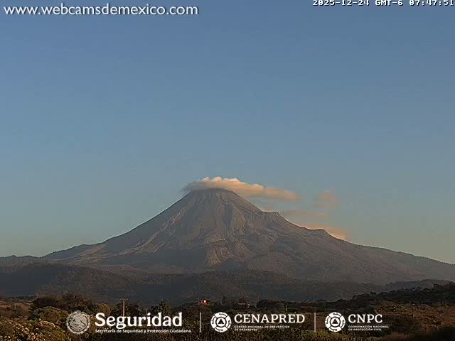 The image displays a dark, clear night sky faintly dotted with numerous small white points of light, likely stars.