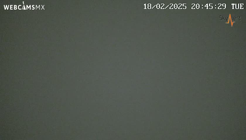 A dark gray, uniformly colored image shows a solid, featureless surface.