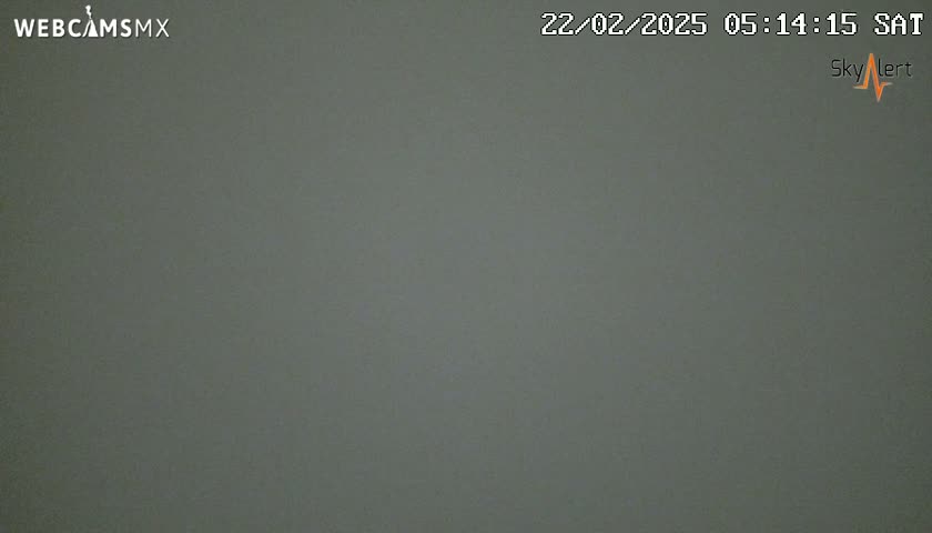 A uniformly gray image shows a solid, overcast sky.