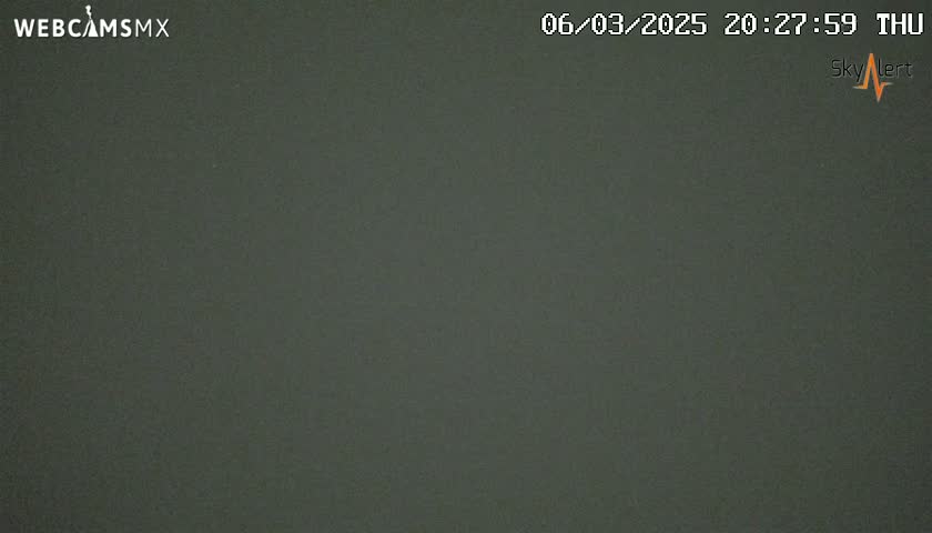 A dark gray, uniformly colored image shows a night-time scene with no discernible features.
