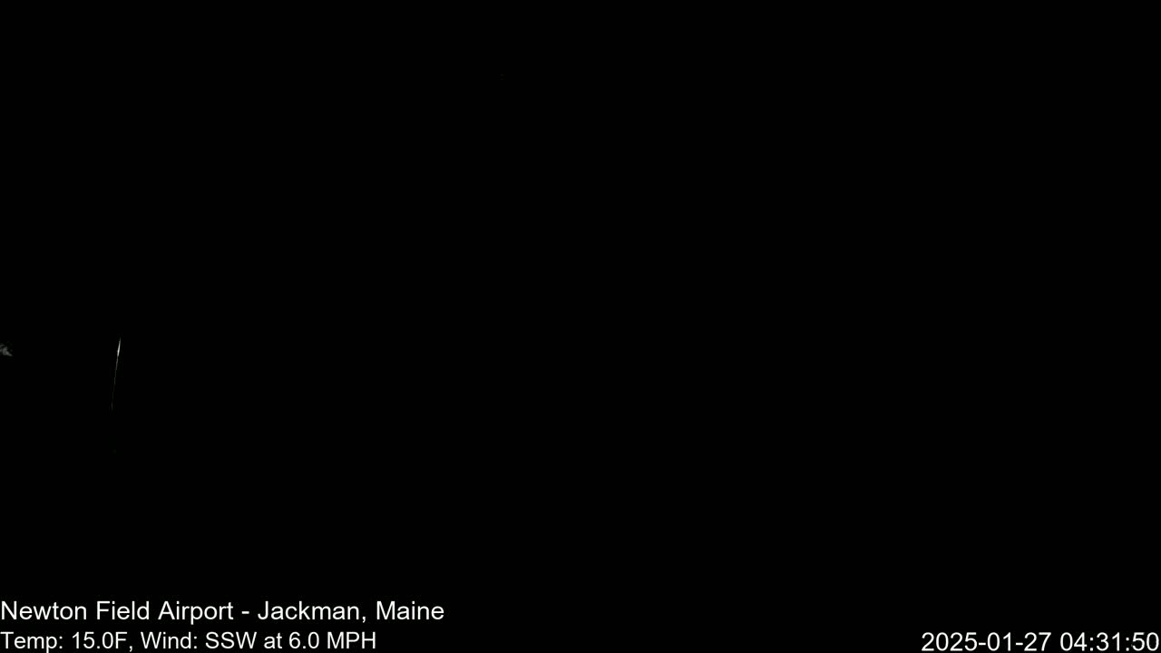 The image shows a completely dark nighttime scene with a 15°F temperature and a 6 mph south-southwest wind.