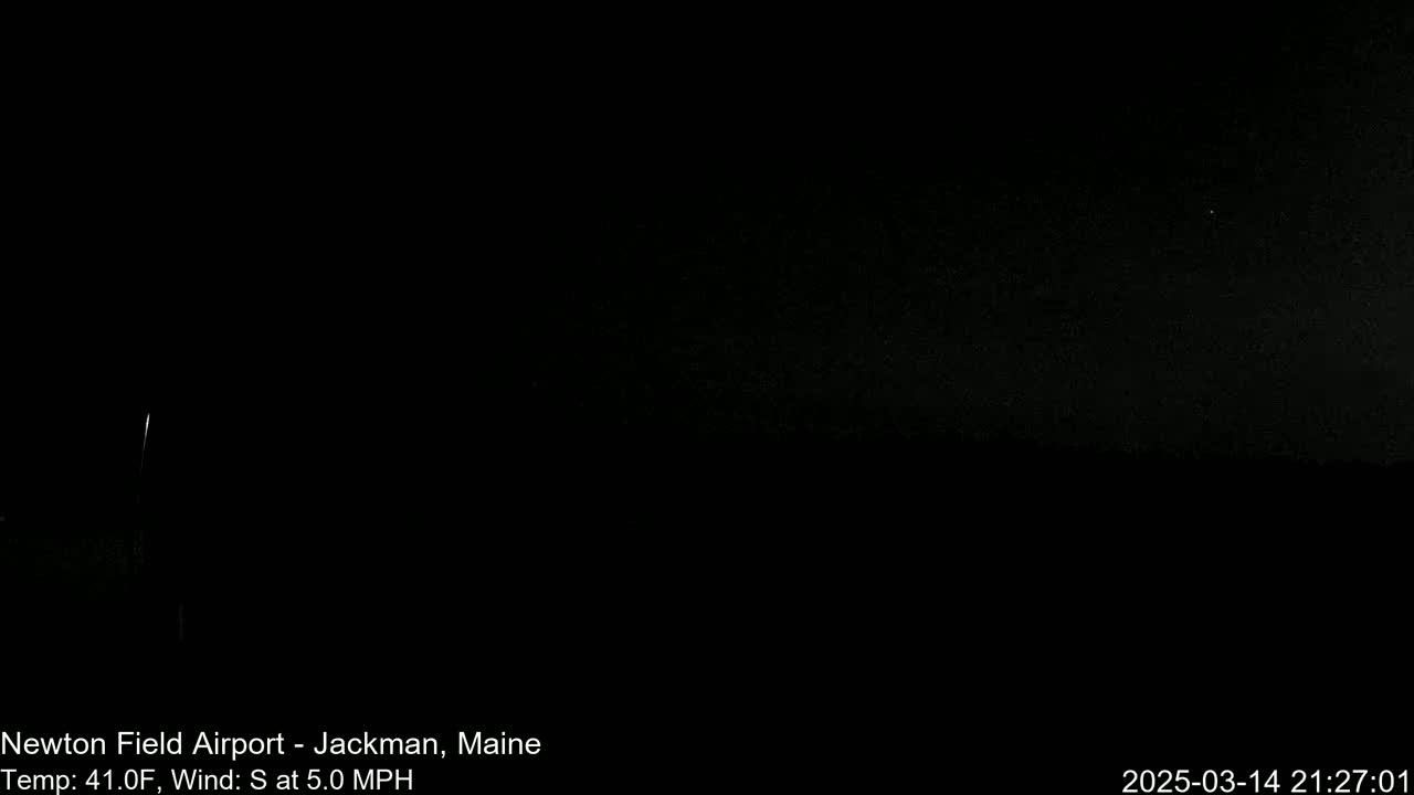 A nighttime outdoor scene shows a dark sky with a faint light source in the distance, under conditions of 41°F and a 5.0 mph south wind.