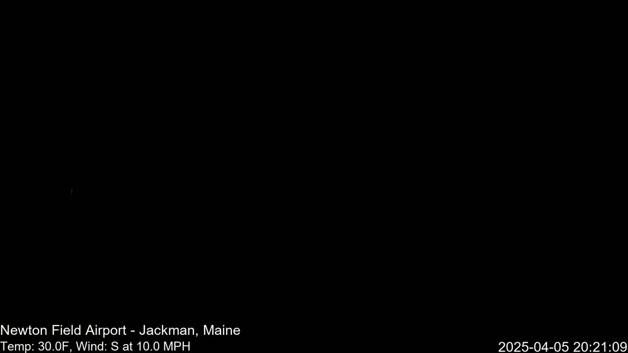A completely black image depicting nighttime conditions with a temperature of 30°F and a south wind at 10 mph.