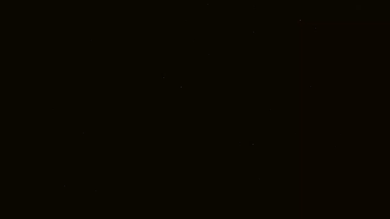 A dark, nighttime sky shows a scattering of faint stars.