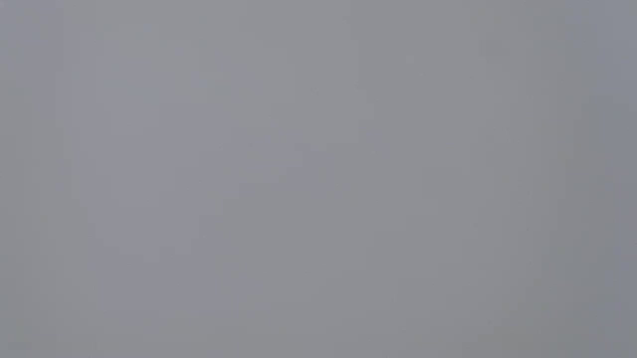A solid, light gray background is shown.
