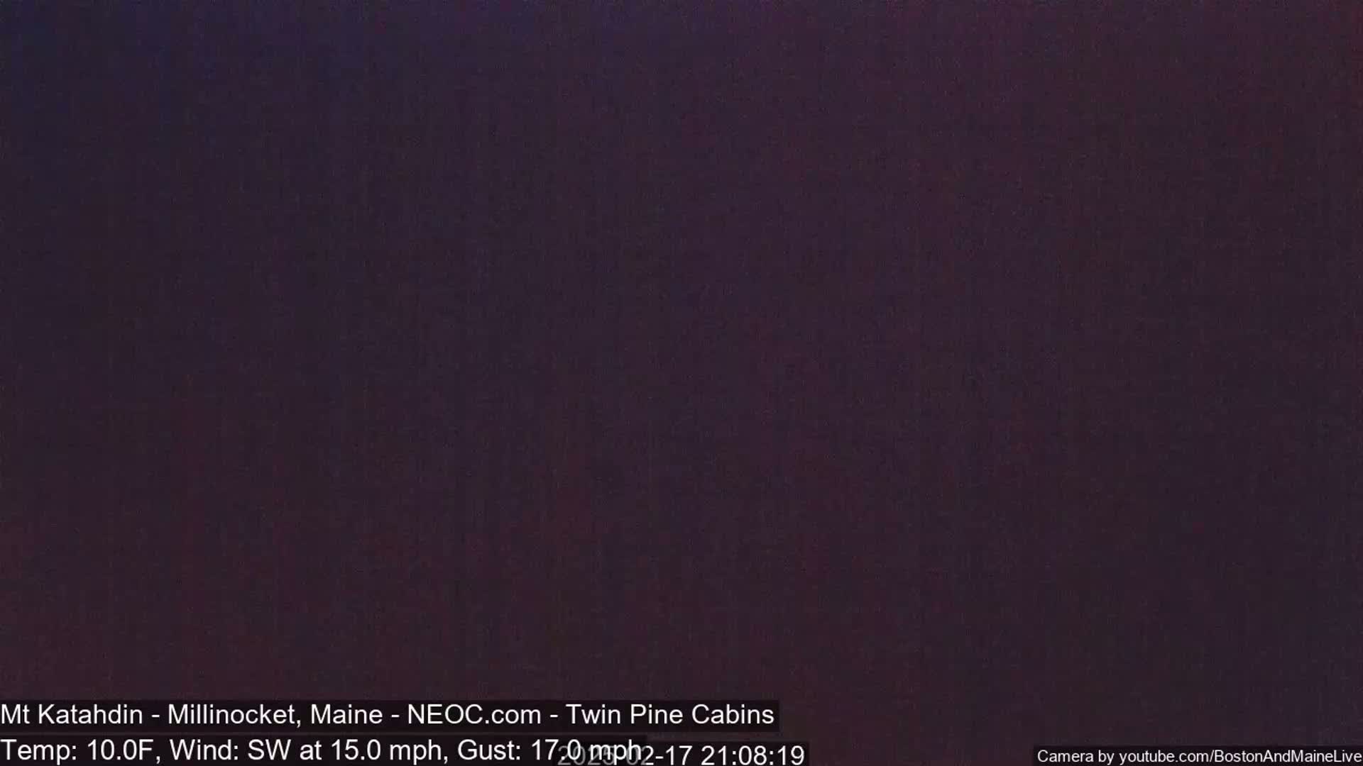 A dark, nighttime image shows a completely black sky.