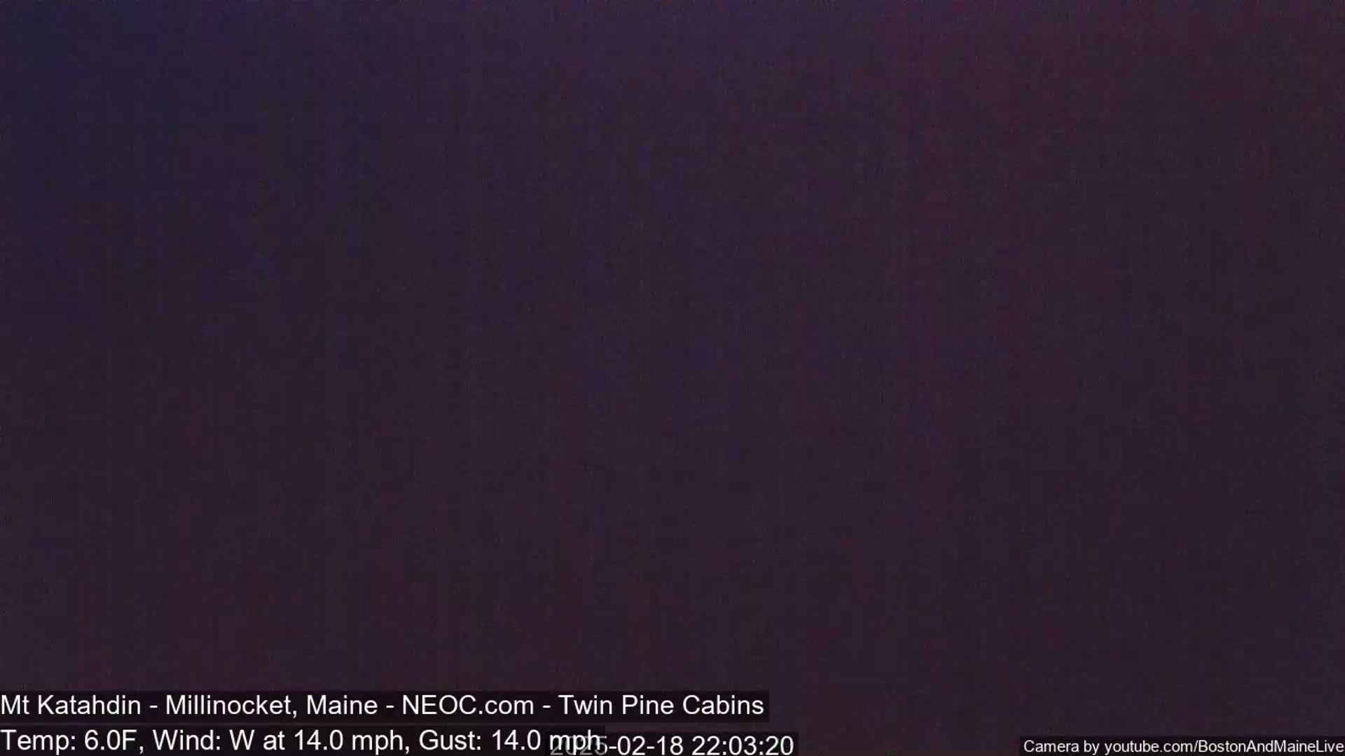A dark, nighttime scene with a westerly wind of 14 mph and gusts up to 14 mph, and a temperature of 6°F.