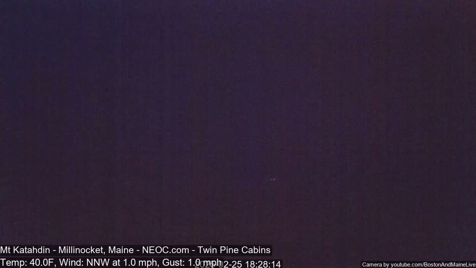 A dark nighttime sky is visible.