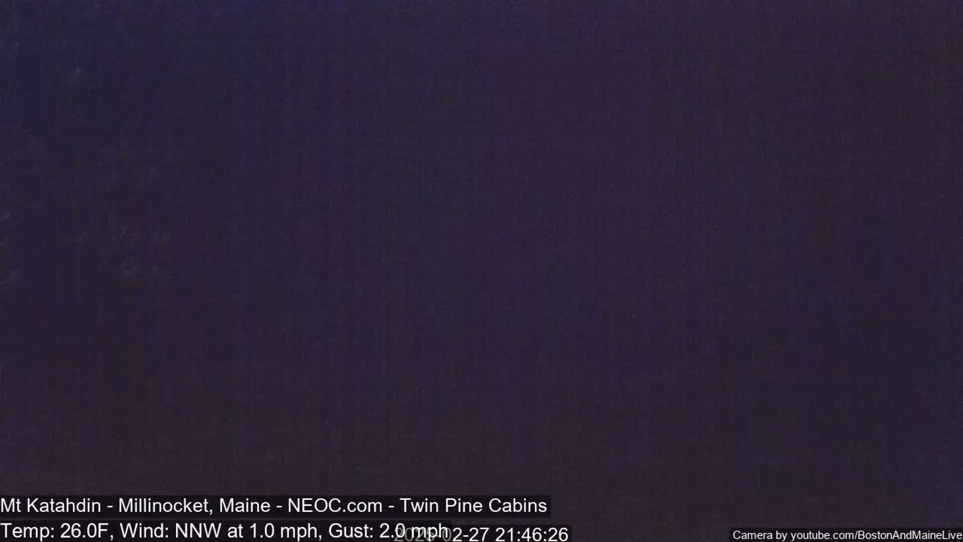 A dark purple nighttime scene is shown.